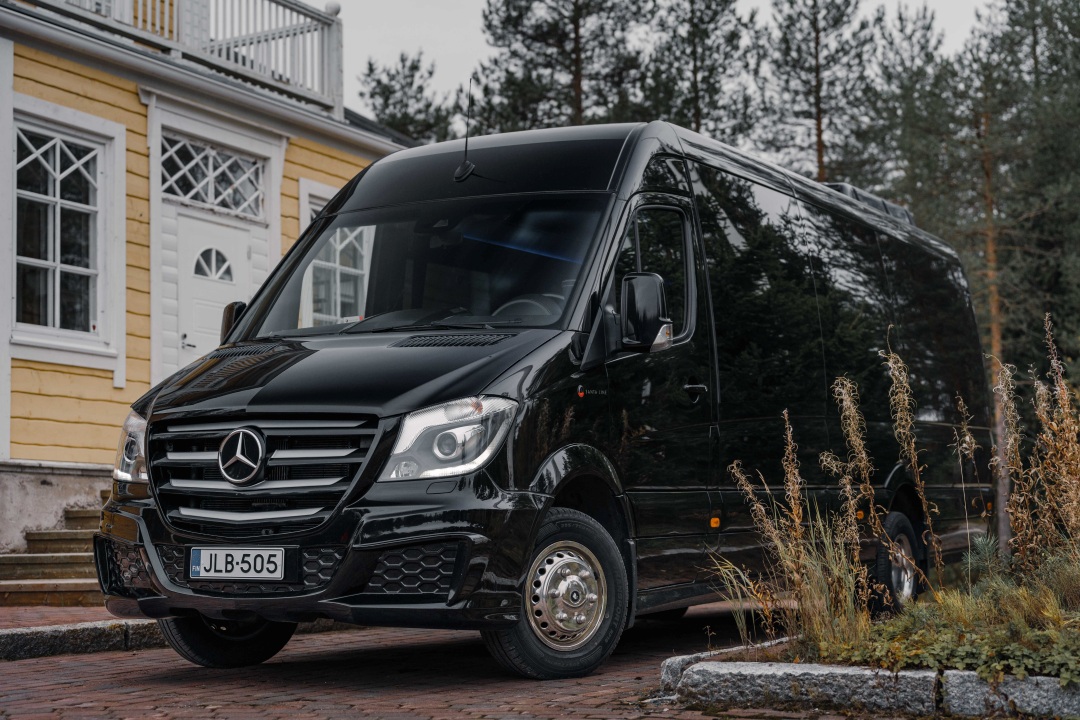 The 16-seat van available for private and larger-group Vulpes Aurora tours.